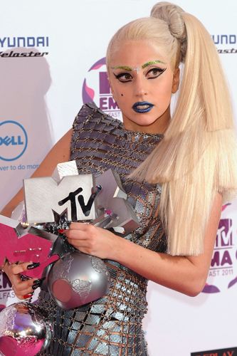 We're not sure what's weighing Miss Gaga down more – her four awards that she scooped at the MTV Europe Music Awards 2011, or her enormous ponytail! It's a severe but striking look so we suggest taking inspiration from it and adding some oomph to your pony next time you're riding it high. We love what the A-listers love and that's A-List Wrap Around Pony Tail Clip In Hair Extensions by Feleny Georghiou (Ł29.99, <a href="http://www.connecthairextensions.com/hair-clip-extensions-products/pony-tail/" target="_blank">connecthairextensions.com</a>)