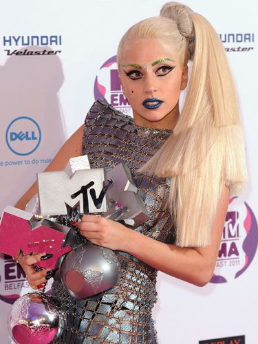 We're not sure what's weighing Miss Gaga down more – her four awards that she scooped at the MTV Europe Music Awards 2011, or her enormous ponytail! It's a severe but striking look so we suggest taking inspiration from it and adding some oomph to your pony next time you're riding it high. We love what the A-listers love and that's A-List Wrap Around Pony Tail Clip In Hair Extensions by Feleny Georghiou (Ł29.99, <a href="http://www.connecthairextensions.com/hair-clip-extensions-products/pony-tail/" target="_blank">connecthairextensions.com</a>)