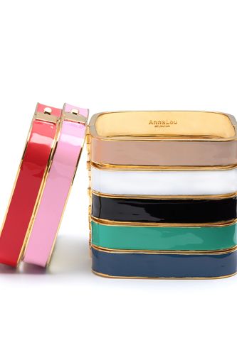 <p>Whoever said squares were boring? Wear these fab enamel bangles alone for a simple, sophisticated look, or stack them if you can't choose a favourite!</p>
<p>Square bangle, £30, <a href="http://www.annalouoflondon.com/productdetails.asp?id=3222&IG=1129 " target="_blank">Annalouoflondon.com</a> </p> 
