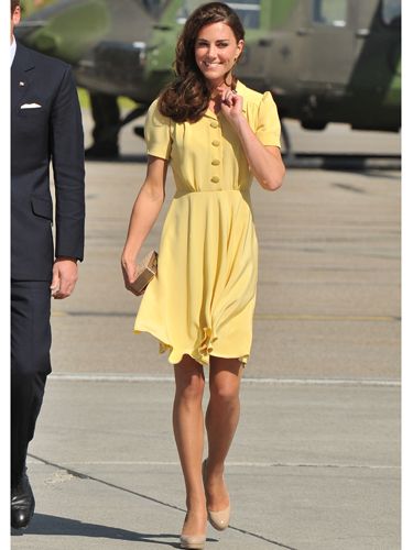 <p>It was a rather different story when Catherine, Duchess of Cambridge arrived in Calgary. She chose a prim canary yellow frock with nude court shoes and a box clutch</p>