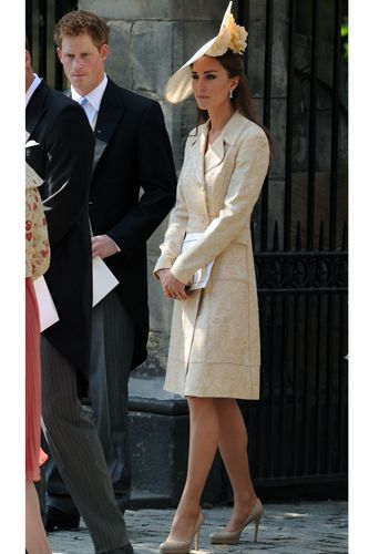 As a guest at Zara Phillips' wedding to Mike Tindall, Kate kept a low profile in a summery nude ensemble. Her cream brocade coat by Jane Troughton (worn for the first time back in 2006 at Laura Parker Bowles' wedding) concealed her dress but all eyes were on her statement floral hat. Bloomin' lovely