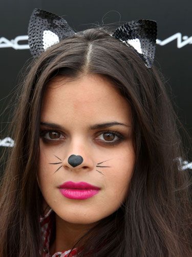 The fashion blogger and model channelled a feline vibe with cute cat ears accompanying a heart on her nose and whiskers 


