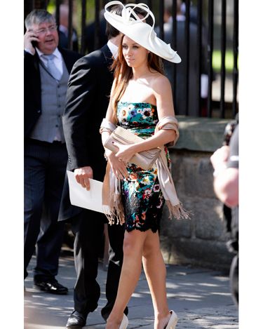 Surprise guest at the royal wedding was The Saturdays star Una Healey. The star showcased a foxy floral frock with a high hem and low neckline for Zara Phillips and Mike Tindall's big day which she paired with equally kinky high heels. We wonder what the Queen made of it!