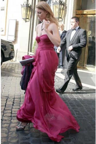 Princess Beatrice has certainly been cracking out some wedding outfit gems recently and this floor-length fuchsia gown by Alberta Ferretti is our fave wedding frock to date. Bea wore the strapless style with some sparkling skyscrapers and matching clutch for Petra Ecclestone's wedding – we just hope she let the bride get at least some attention!