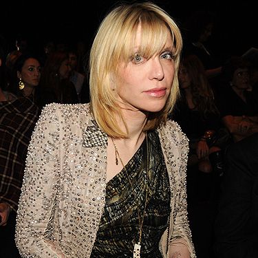 Actually forget Lindsay Lohan, the original hot-mess has arrived! Courtney Love took her place at the Roberto Cavalli show. We have to say, she's looking pretty good!
 