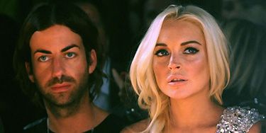 Actress (and our favourite hot-mess) Lindsay Lohan attended the Philipp Plein Urban Jungle Spring/Summer 2012 fashion show at Milan Fashion Week. She's looking healthy these days (it could be the fake tan, we're not sure!) and we love her side plait
