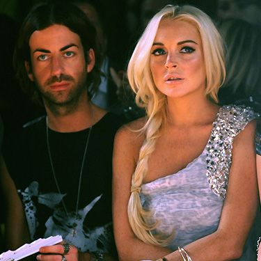 Actress (and our favourite hot-mess) Lindsay Lohan attended the Philipp Plein Urban Jungle Spring/Summer 2012 fashion show at Milan Fashion Week. She's looking healthy these days (it could be the fake tan, we're not sure!) and we love her side plait