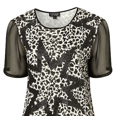 Leopard print is our favourite print! Yes, we know we're pretty fickle, it'll be dalmatian tomorrow! For now though, this tee has gotten us all excited. Having both leopard and star print, not to mention sheer sleeves – it's the ultimate fashion piece!
<p>£32, <a href="http://www.topshop.com">Topshop</a></p>
