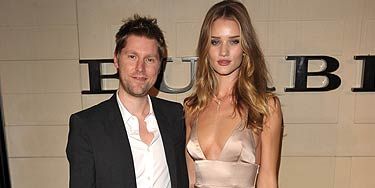 Burberry Chief Creative Officer Christopher Bailey and the foxy Rosie Huntington-Whiteley hosted a cocktail party to celebrate the launch of Burberry Body in Beverly Hills, and don't the pair of them look swish?