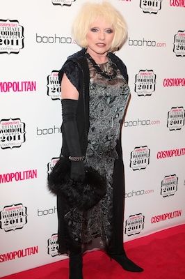 Debbie Harry looked an absolute stone-cold fox at the Cosmopolitan Ultimate Women Awards... we're completely bowled over by all those different textures, the decadent gloves and the fun faux fur accessories. But how did Debbie Harry evolve to be an ultimate style icon? Let's take a look back...