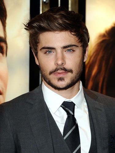 Gone are the days when pretty boy Zac Efron was the perfect part for High School Musicals - he's now a fully-fledged man! We reckon his moustache gives him just the right amount of macho points, perfect against those dreamy blue eyes. Gush!
