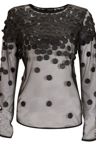<p>Those clever folks at Topshop have done it again! This fantastic sheer black top is bedecked with a multitude of black leather discs, creating something ultra-sharp and up-to-the-minute stylish that you can just throw on with anything. Result!</p>
<p>£60, <a href="http://www.topshop.com">Tosphop</a></p>