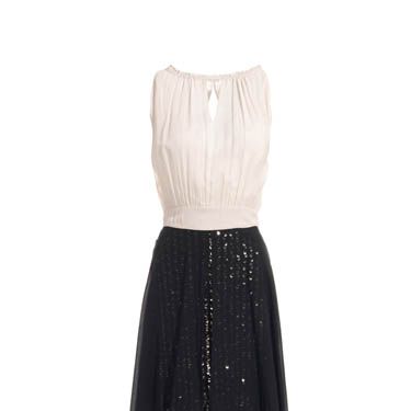 <p>Sophisticated sequins are just as impressive as the bold statement dresses. This look from Reiss is elegant and regal, and perfect teamed with vintage jewellery</p>

<p>£225, <a href="http://www.reissonline.com/shop/womens/dresses/party_dresses/kamille/black/#">
Reiss</a></p>