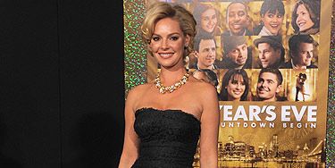 Katherine Heigl showed off her super svelte figure at the Hollywood premiere of New Year's Eve. Voluminous hair and metallic accessories completed her look to perfection
