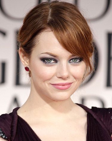 Emma Stone went for a smoky eye and a light pink hue for the lip at the Golden Globe Awards. Her hair was swept loosely up, to show off her gorgeous feline eyes we suspect