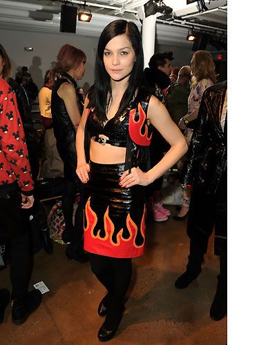 <p>The girl's on fire! Leigh Lezark, a front row fixture at NYFW, looked like she'd give biker chicks a run for their money at the Jeremy Scott show in a full-on leather outfit complete with flame design</p>