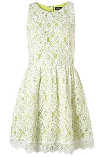 <p>Lace needn't be boring – especially when layered over a contrasting bright colour. Here, zingy lime gets toned down with a white lace overlay – this is the dress that will see you through this season and beyond.</p>
<p>Sleeveless lace dress, £48, <a title="Topshop" href="http://www.topshop.com/webapp/wcs/stores/servlet/ProductDisplay?beginIndex=0&viewAllFlag=&catalogId=33057&storeId=12556&productId=4702932&langId=-1&sort_field=Relevance&categoryId=277012&parent_categoryId=208491&pageSize=200" target="_blank">TOPSHOP </a></p>