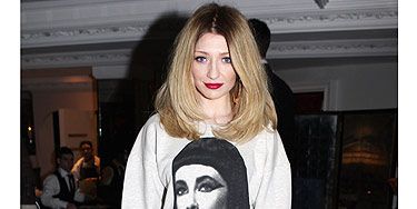 <p>Words can't express how much we love Nicola Roberts. When we hot-footed it to the Topshop NEWGEN10 London Fashion Week party we couldn't stop looking at her (yes, we know that's totally not cool!), she just looked so fab. She wore Topshop (natch!), chic ankle boots, big hooped earings - great look Nic!</p>