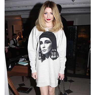 <p>Words can't express how much we love Nicola Roberts. When we hot-footed it to the Topshop NEWGEN10 London Fashion Week party we couldn't stop looking at her (yes, we know that's totally not cool!), she just looked so fab. She wore Topshop (natch!), chic ankle boots, big hooped earings - great look Nic!</p>