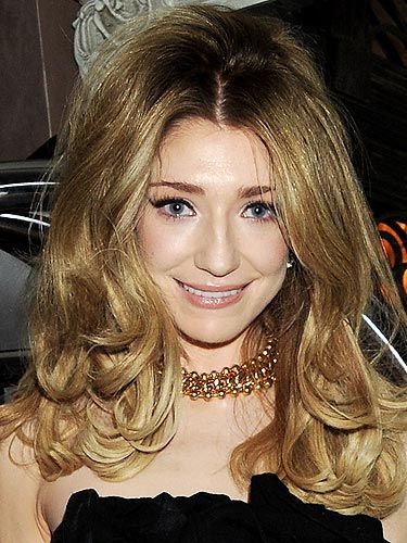 <p>It looks like Nicola Roberts has taken hairstyle tips from Kate Middleton. Check her out rocking a regal hairstyle here with her LBD. You can't deny that her honey-coloured locks look fab-u-lous! We've heard hairstylist Trevor Sorbie is keen to fight frizz yet add volume (which is no mean feat!), so head to Boots or <a title="http://www.boots.com/" href="http://www.boots.com/" target="_blank">Boots.com</a> and get his Beautiful Volume range, priced at a very reasonable £5.10.</p>