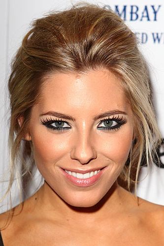 <p>We're used to seeing Mollie King with amazing full-bodied hair - often down. But here she is showing off a very casual updo. For this hairstyle back-combing is key for creating height through the crown. Use a soft bristle brush and brush in one direction to avoid knotting.</p>
<p>Mason Pearson Pure Bristle Brush, £68.75, <a title="http://www.escentual.com/" href="http://www.escentual.com/" target="_blank">Escentual.com</a></p>