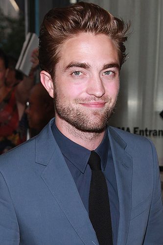 <p>Phwoar! Look at Robert Pattinson looking fit in his Gucci Cruise 2013 suit at the New York premiere of Cosmopolis. We think he looks absolutely scrummy. And if you've seen clips of his first interview post KStew-split, you'll want to take him in your arms and give him a massive hug. Come 'ere Rob... </p>