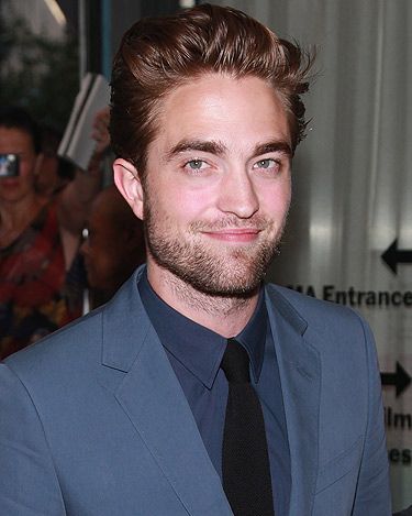 <p>Phwoar! Look at Robert Pattinson looking fit in his Gucci Cruise 2013 suit at the New York premiere of Cosmopolis. We think he looks absolutely scrummy. And if you've seen clips of his first interview post KStew-split, you'll want to take him in your arms and give him a massive hug. Come 'ere Rob... </p>