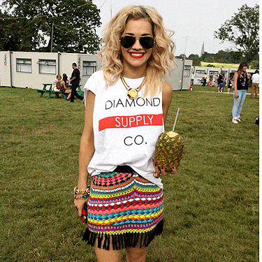 We admit it, we're a bit jel of Rita Ora's style. She always looks fab in outfits that technically shouldn't work. She didn't disappoint in this cool getup at V Festival. The singer wore a print t-shirt with a multi-coloured knitted skirt and trainers. She finished off the lookwith a bit of bling, aviator shades, and of course, red lippie. Sigh, why doesn't it work for us?!