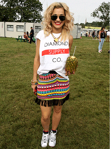 We admit it, we're a bit jel of Rita Ora's style. She always looks fab in outfits that technically shouldn't work. She didn't disappoint in this cool getup at V Festival. The singer wore a print t-shirt with a multi-coloured knitted skirt and trainers. She finished off the lookwith a bit of bling, aviator shades, and of course, red lippie. Sigh, why doesn't it work for us?!