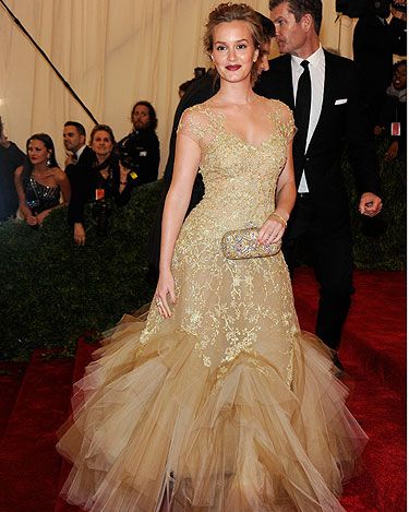 <p>What's this, Leighton Meester getting back to her blonde roots? Say it ain't so. But moving on from the hair, let's talk Met Ball Gala frocks. We're very much feeling Leighton's Marchesa gown with it's mega tulle accents - it's a good look for the Gossip Girl star</p>