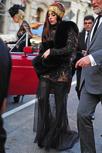 <p>Last night it was the launch of Lady Gaga's 'Fame' Eau de Parfum at the Guggenheim Museum in New York. Of course, Lady Gaga attended – why wouldn't she? Wearing a gothic black studded mesh dress, stockings and platform boots, and for a punch of colour she added a gold headband and a vibrant red lipstick</p>