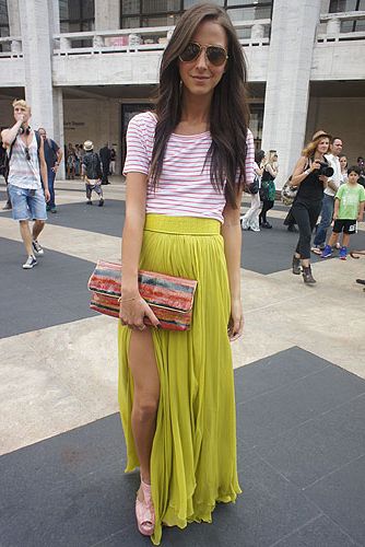 <p><em>Fashion blogger</em></p>
<p>Arielle got all Angelina Jolie on us in this split yellow maxi skirt. Paired with a striped clutch and top, she's got us wishing it was summer ALL the time</p>