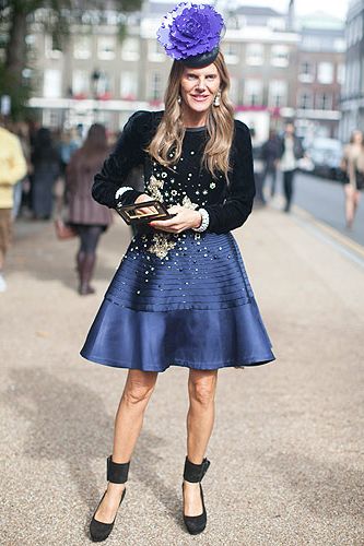 <p>We caught Anna Dello Russo outside the Topshop show at London Fashion Week looking absolutely amazing with that blue satin skirt and matching floral hat. The editrice is about to launch her accessories collection for H&M and we can't wait to get our hands on her blinging pieces!</p>