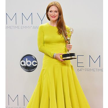 <p>Academy award nominated actress Julianne Moore won her first Emmy award for best actress in miniseries/movie for her brilliant performance as Sarah Palin in Game Change. She wore a gorgeous full-length yellow Dior couture dress with a radiant winner's smile. Congrats!</p>