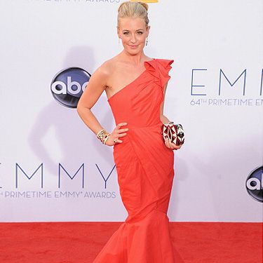 <p>Our favourite TV show host Cat Deeley was nominated yet again for her fabulous performance on So You Think You Can Dance. She attended the 2012 Emmy Awards in an uh-maze red one-shoulder mermaid gown that couldn't have looked more fabulous on her. Red hot!</p>