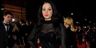 <p>Wow! After this smoking hot leather look, we wouldn't be surprised to see X factor judge Tulisa Contostavlos casted for a James Bond film. She showed up at the world premiere of Skyfall with this sexy skirt and top ensemble and paired it with strappy silver platform heels. Of course, the look couldn't be complete without a bright red lip. Hot!</p>