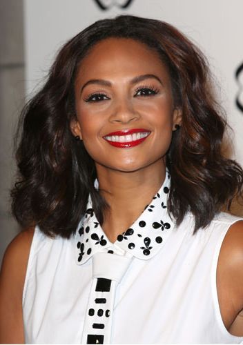 <p>Ooh, we loved Alesha Dixon's smooth wavy hair at the Cosmopolitan Ultimate Women of the Year awards at Victoria & Albert museum. She paired it with a brilliant red lip for that ultra catty beauty look we love so much. To get the look, scrunch in some <a href="http://female.vo5.co.uk/products/smoothly-does-it/#curl-defining-mousse" target="_blank">Vo5 Curl Defining Mousse</a> to score these amazing curls without the frizz.</p>