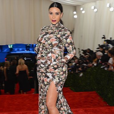 <p>For her debut appearance at the Met Ball, Kim chose to covert her curves in head-to-toe florals in a dress designed by Givenchy. The full-on fabric may have attracted attention for the wrong reasons with some critics slamming the look but the designer himself said she was 'the most beautiful pregnant woman' he's ever worked with. High praise indeed. <br /> </p>