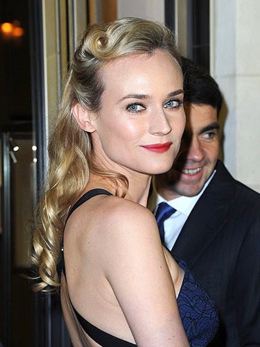 <p>Diane Kruger sported an awesome retro hairstyle at the Jaeger store opening in Paris. She wore her hair half up with two victory rolls at the sides curled to perfection. The best way to work this classic vintage trend is with soft eye makeup and fierce matte red lips. We couldn't have done it better ourselves!</p>