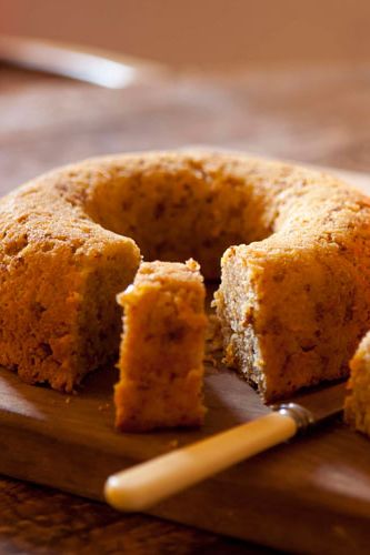 <p>  Preheat the oven to 180°C/Gas mark 4.</p>
<p>In a mixing bowl, beat the butter to a cream, using a wooden spoon or a hand-held electric whisk. Add the sugar and continue to  beat until well creamed. (It won't be as light and fluffy as a classic sponge mix.) </p>
<p>Add the eggs, one at a time, adding 1 tbsp of the flour with each, and beating well  before adding the next. Sift in half the remaining flour, then use a large metal spoon  to carefully fold it in.Repeat with the other half.</p>
<p>Fold in the grated pumpkin,  crushed amaretti or macaroons, and the milk – to give a soft dropping consistency. </p>
<p>Spoon the mixture into the prepared tin and bake in the oven for 45 minutes, until  the cake is lightly golden, springs back to shape when pressed with a finger and is  beginning to pull away from the sides of the tin.</p>
<p>Leave in the tin for 5 minutes  before carefully turning out and placing on a wire rack to cool. </p>
<p>For children, trickle the cake with orange glacé icing and scatter with sweets. For  adults, serve it plain with hot mulled cider punch. It will keep in a tin for 5 days. </p>
<p><strong>Variation :</strong> Add 50g mini marshmallows along with the amaretti for a gooey Hallowe'en cake.  </p>
<p>Taken from The River Cottage Cakes Handbook by Hugh Fearnley-Whittingstall (£14.99, Bloomsbury)</p>