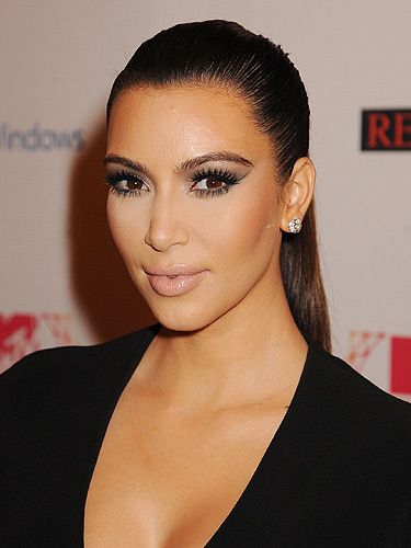 <p>Smoky eyes, nude lips and luminous skin - we wouldn't mind rocking Kim Kardashian's signature beauty look on our wedding day. That ultra sexy, high drama makeup works perfectly with a winter-themed occasion (and definitely shake off any nerves that evening).</p>
<p>To achieve this look, it's all about the false lashes. We love <a href="http://www.maccosmetics.co.uk/product/150/1038/Products/Eyes/Lash/12-Lash/index.tmpl" target="_blank">MAC Cosmetics False Lashes in 12 Lash</a> because it offers high drama while still looking natural.</p>
