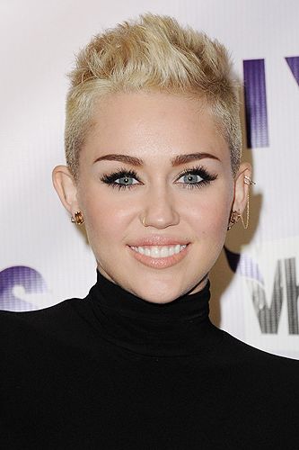 <p>It looks like singer Miley Cyrus has finally sealed her signature hairstyle. She arrived at the 2012 VH1 Divas in LA flaunting a very boyish short bouffant hairstyle that looked super fresh. She softened this edgy look with a lot of mascara and glossy peach lips, highlighting her best features.</p>