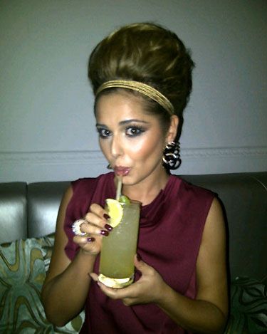 Though Cheryl Cole is new to the Twittosphere this hasn't stopped her mastering the art of a Twitpic. Check out Chezza's barnet – her beehive is almost as high as Marge Simpson's

