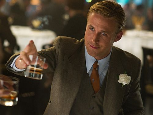 <p>Hubba hubba, Ryan Gosling looks HOT in his new film, Gangster Squad. We can't wait to see him suited and booted, drinking Whiskey and being all badass scaring people with his beautiful blue eyes. The film also stars Sean Penn, Josh Brolin and Emma Stone - who of course plays the love interest for Ryan (surprise surprise!). The film is released on the 10th January.</p>