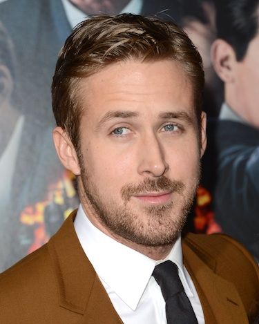 <p>Phwoar! Ryan Gosling stepped out for the LA premiere of his new film, Gangster Squad. The hottie-mc-hottie wore a Gucci made to order brown Marseille notch lapel two button three piece suit with white dress shirt and black satin tie. The delicious actor teamed his dashing suit with designer stubble and come hither eyes. Don't you just love him?!</p>