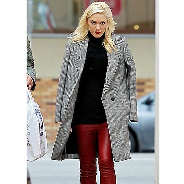 <p>She's the ultimate rock chick so it's no wonder Gwen Stefani wears her rockin' red leather trousers with ease.</p>
<p>In true Gwen style, she gives an otherwise casual look a polished edge, with heeled ankle boots and a tailored check coat (worn oh-so stylishly over her shoulders!) - plus her trademark red lippy, of course.</p>
<p>The fashion brave should follow suit - coloured leather is the fresh way to wear slick slacks this season - and Gwen sure looks RED HOT in hers!</p>