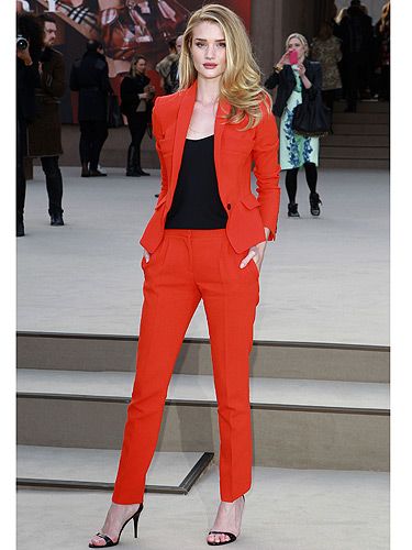 <p>Bombshell alert! Rosie Huntington-Whiteley rocked red like a pro as she made her way into the Burberry Prorsum London Fashion Week show. Seriously, how can she ooze this amount of sex appeal? Teach us Rosie, please!</p>