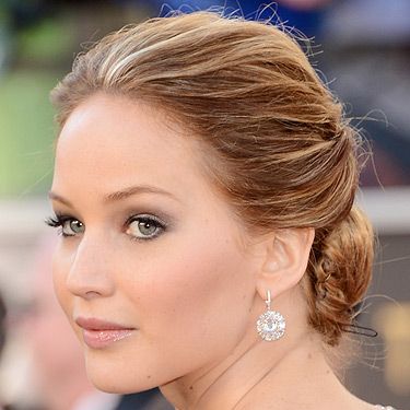 <p>Actress Jennifer Lawrence looked fantastic in that messy updo hairstyle at the 2013 Academy Awards. The Silverlinings Playbook star opted for a very soft, bridal-inspired beauty look with those pretty pink lips and cheeks. We're totally voting on Jennifer to take home the award for Best Actress! *fingers crossed*</p>
<p> </p>
<p><a title="http://www.cosmopolitan.co.uk/beauty-hair/news/styles/oscars-2013-celebrity-hair-trends" href="http://www.cosmopolitan.co.uk/beauty-hair/news/styles/oscars-2013-celebrity-hair-trends" target="_self">SEE THE OSCARS 2013 HAIR TRENDS</a></p>