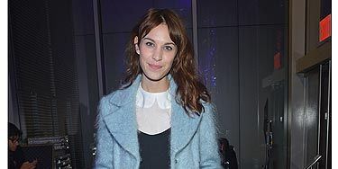 Sigh. We want to BE Alexa Chung, the girl has an impressive wardrobe. The style maven pulled off the winter pastel trend with minimal effort in a powder blue winter coat at the The Armory Party at MOMA. She teamed her coat with her outfit de rigueur; a white Peter Pan collar blouse, LBD and a pair of black platform shoes. Perfect.