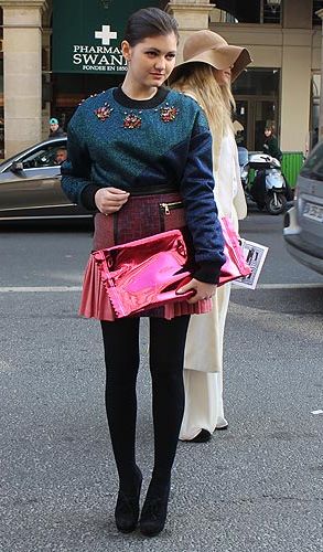 <p>The street style snappers couldn't get enough of this fashionista working a super-fabulous look at Paris Fashion Week. Checking out that is-it-actually-a-giant-sweet-wrapper clutch bag? It is, in fact, a Martin Margiela for H&M number we're loving rather a lot.</p>